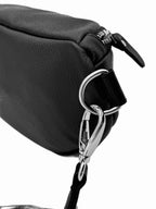 Leather belt bag flat lay showing full silhouette