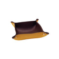 Handcrafted Italian leather valet tray in brown and yellow with gold snaps, on white background