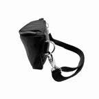 Leather belt bag close-up showing polished metal zipper