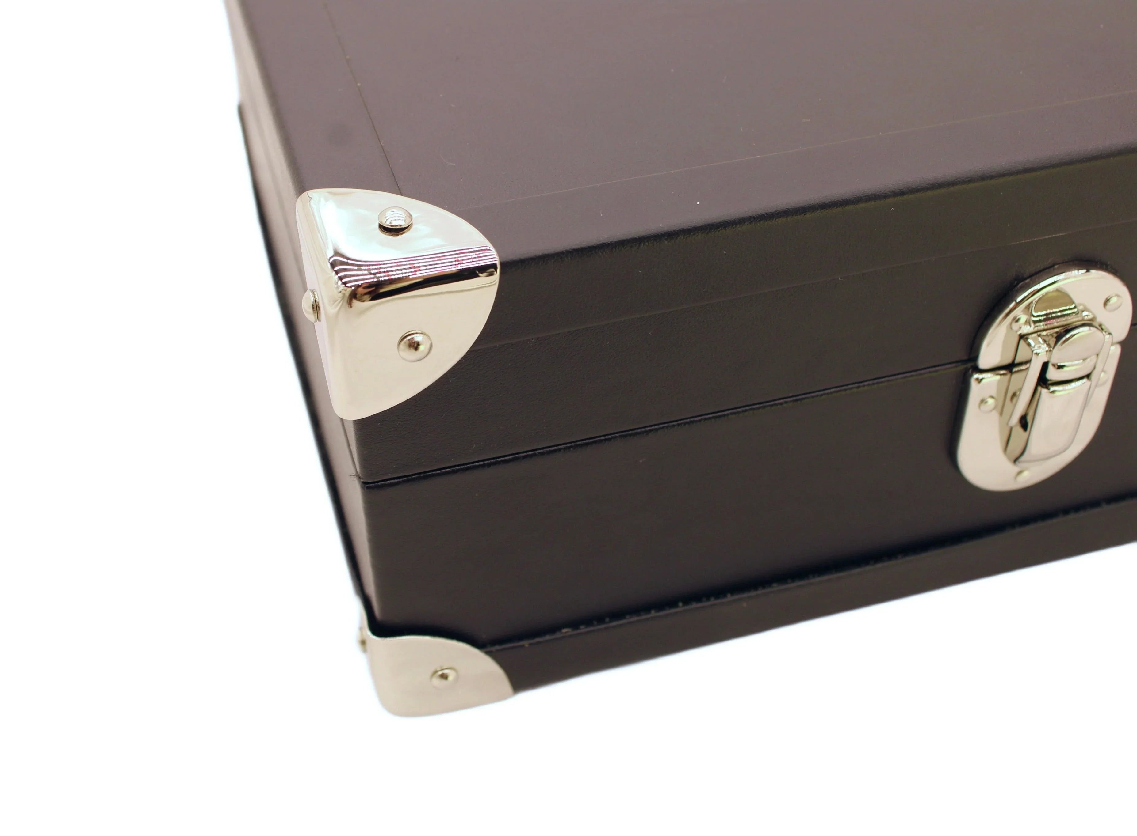 Close-up of luxury black leather box with silver metal corners and latch