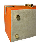 Watch & Jewelry Box in orange leather, close-up of leather texture