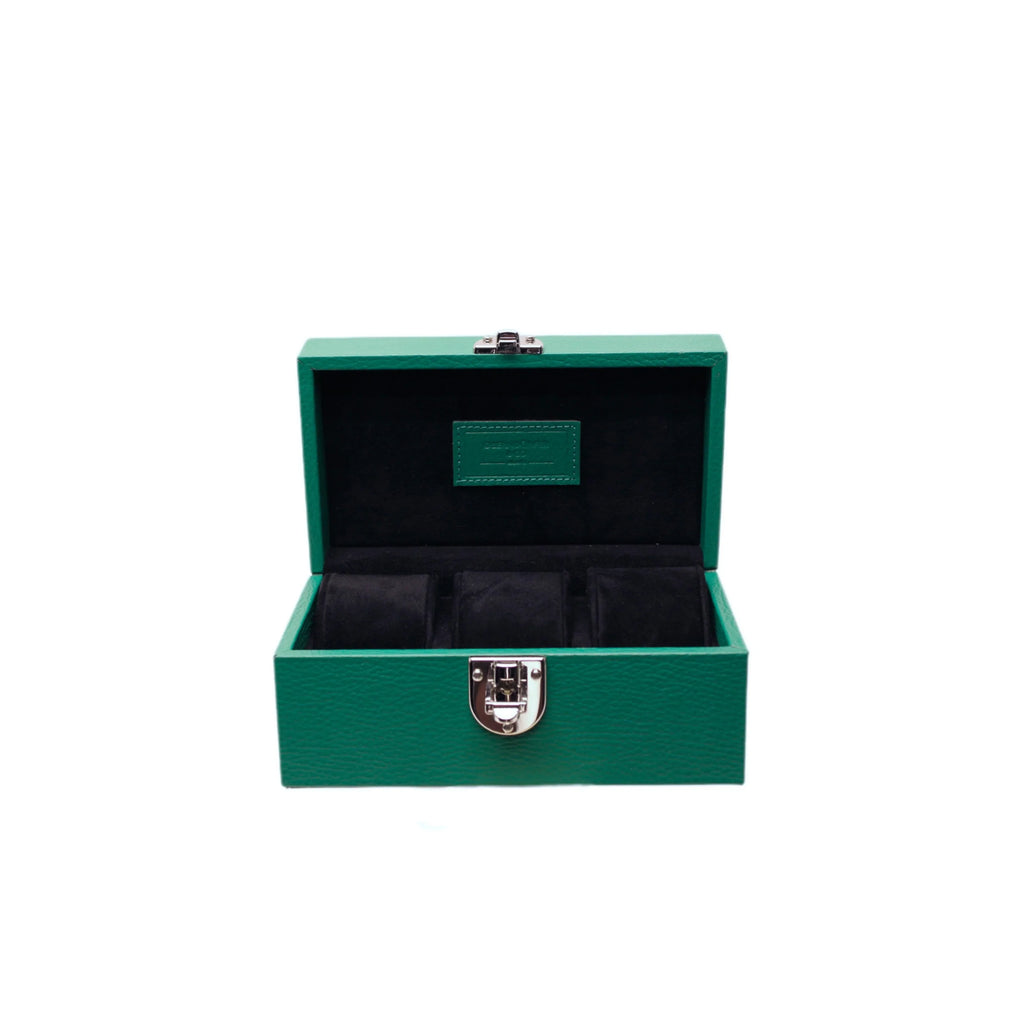 Green handcrafted leather watch box with silver clasp and black velvet interior
