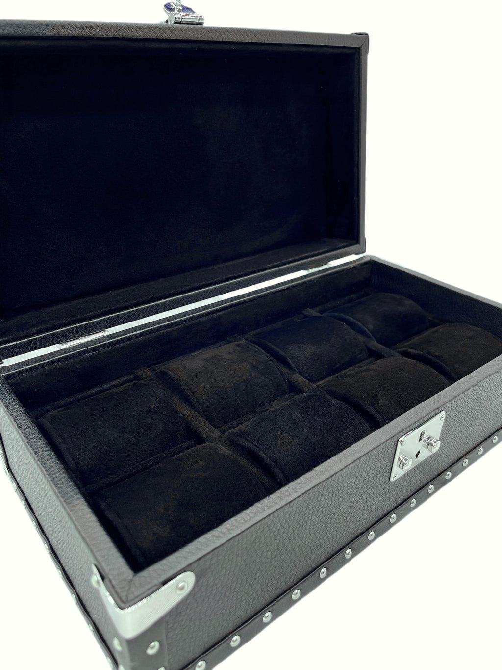 Luxury black leather watch box with metal hardware and velvet interior, open lid view