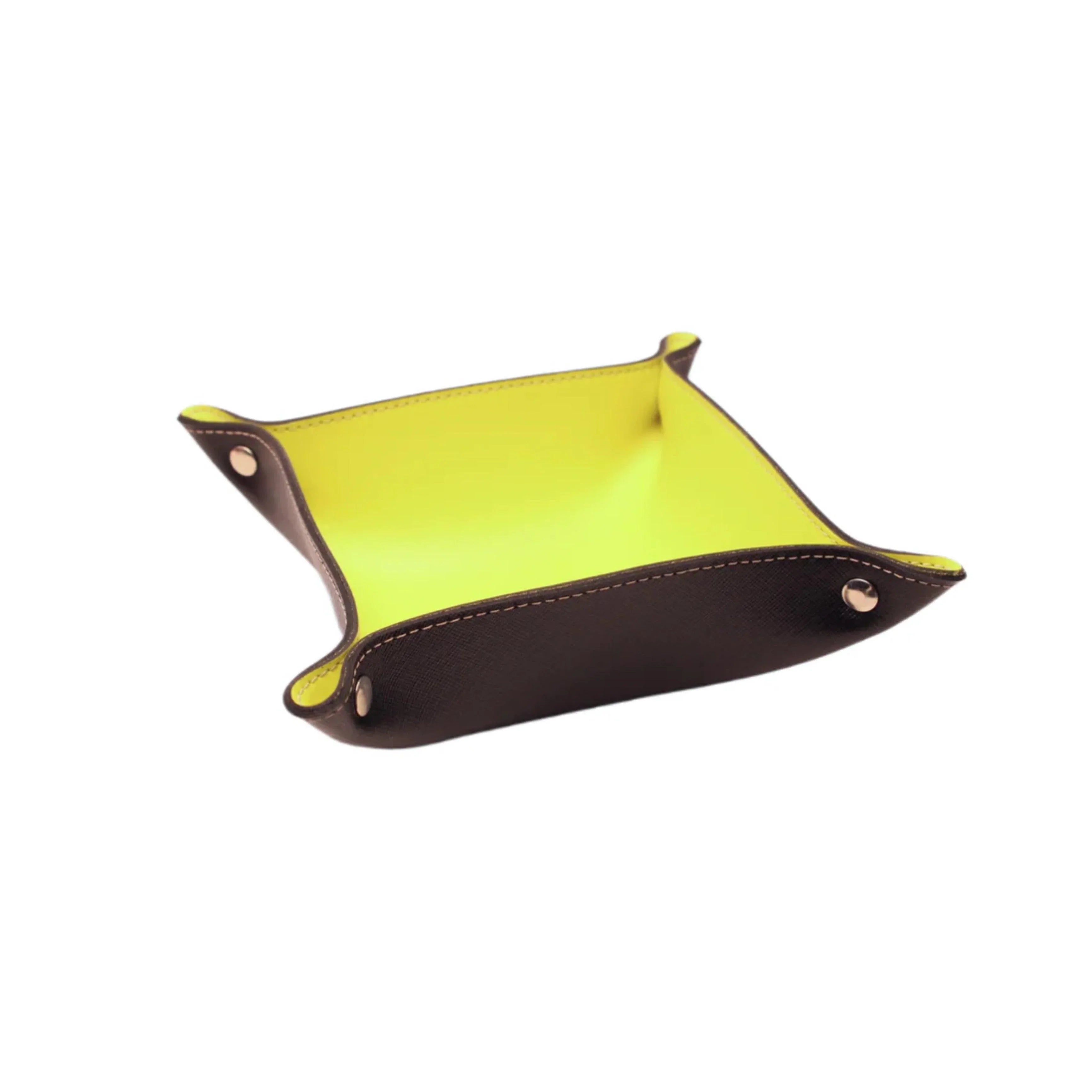 Brown and yellow leather valet tray with gold snaps on white background