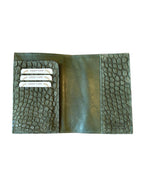 Open green crocodile leather wallet with four credit card slots, handcrafted Italy