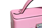 Pink Mirror Handbag styled on shoulder with chain strap