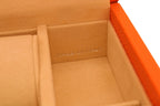 Close-up of a tan suede-lined luxury leather box with Made in Italy embossed inside
