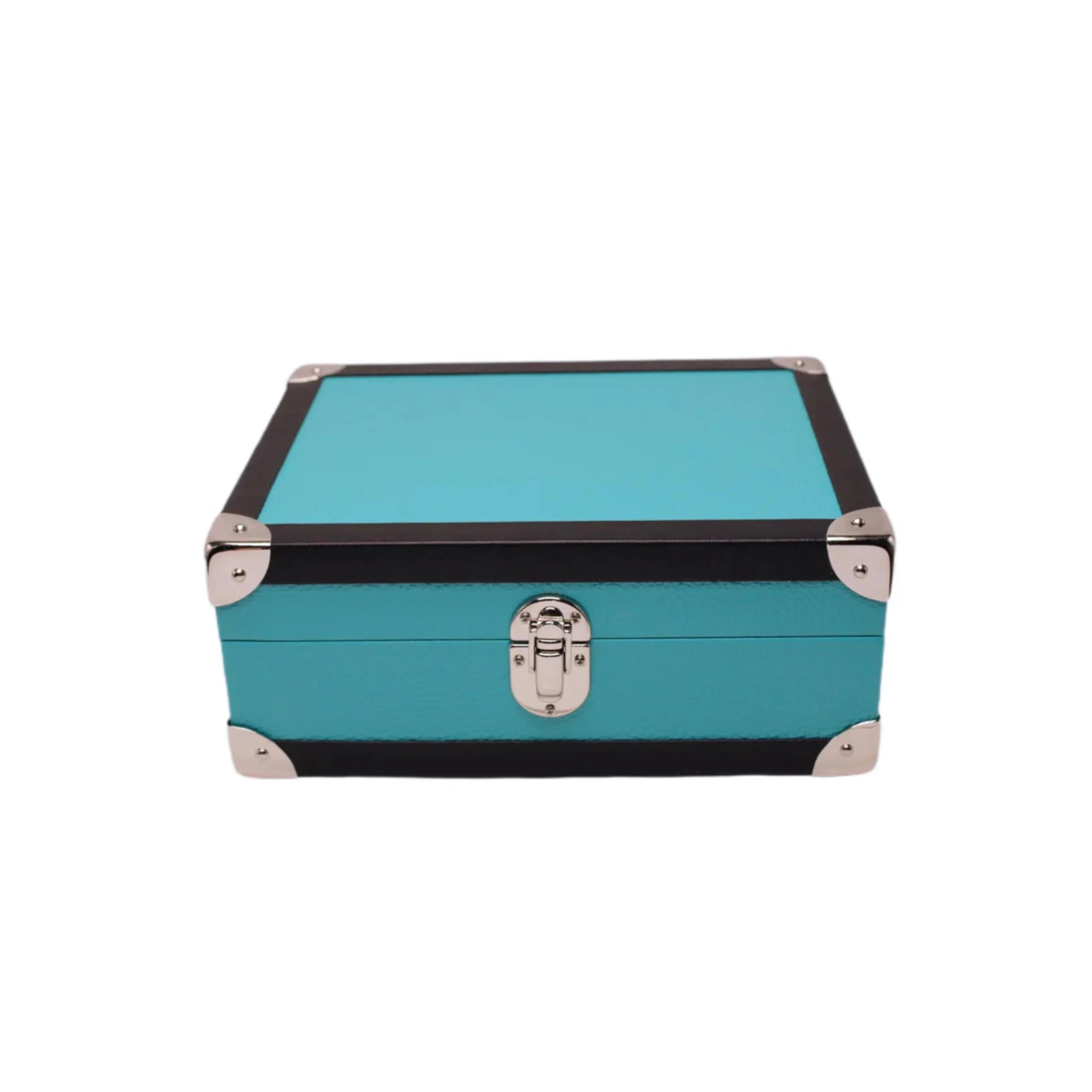 Turquoise leather storage box with black trim and metal corners, closed and latched