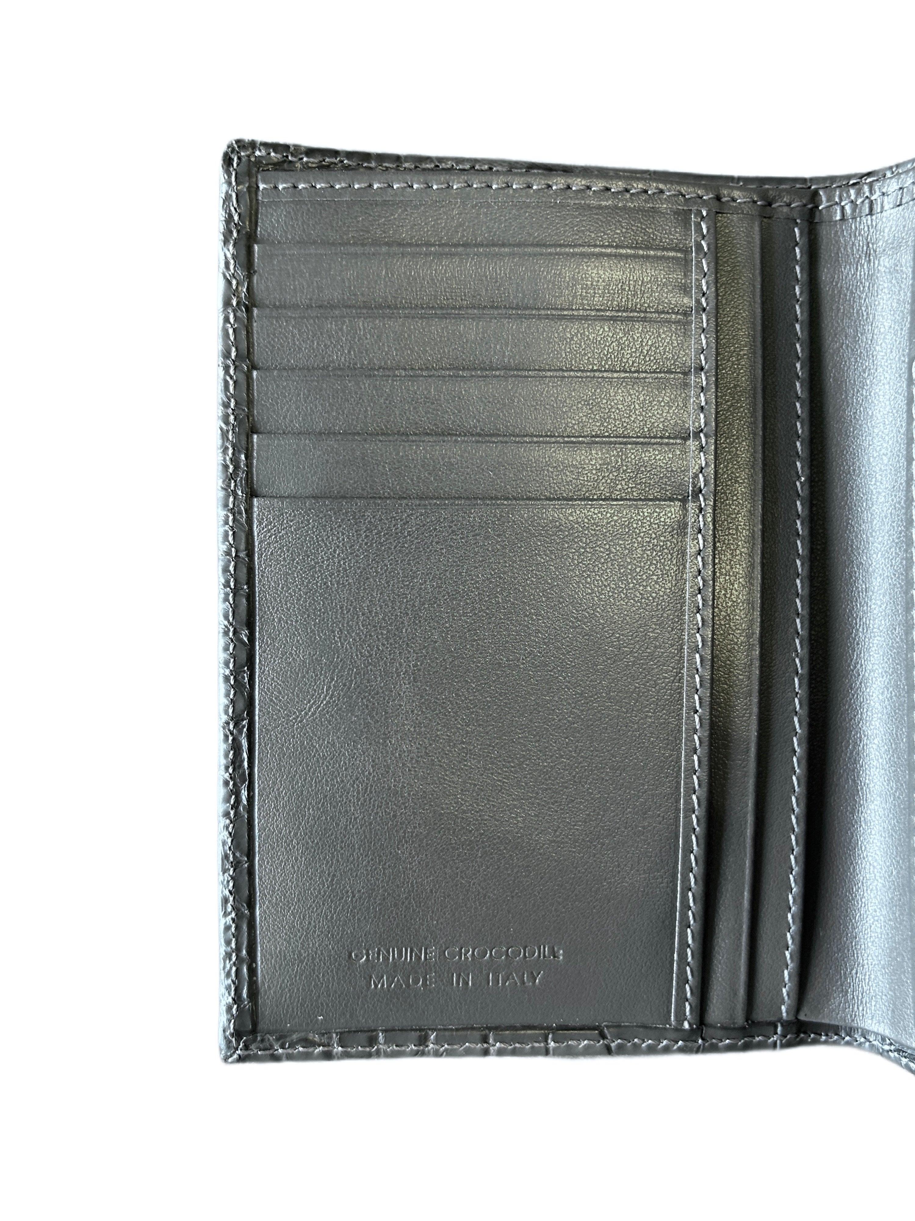 Interior of luxury grey genuine crocodile leather wallet with card slots, made in Italy