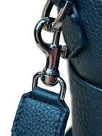 Blue leather briefcase close-up of Togo leather texture
