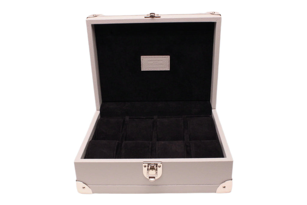 Luxury Italian leather watch box with black velvet interior and metal clasp, open lid