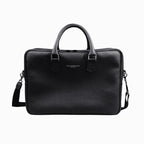 Black leather briefcase side view showing structured silhouette