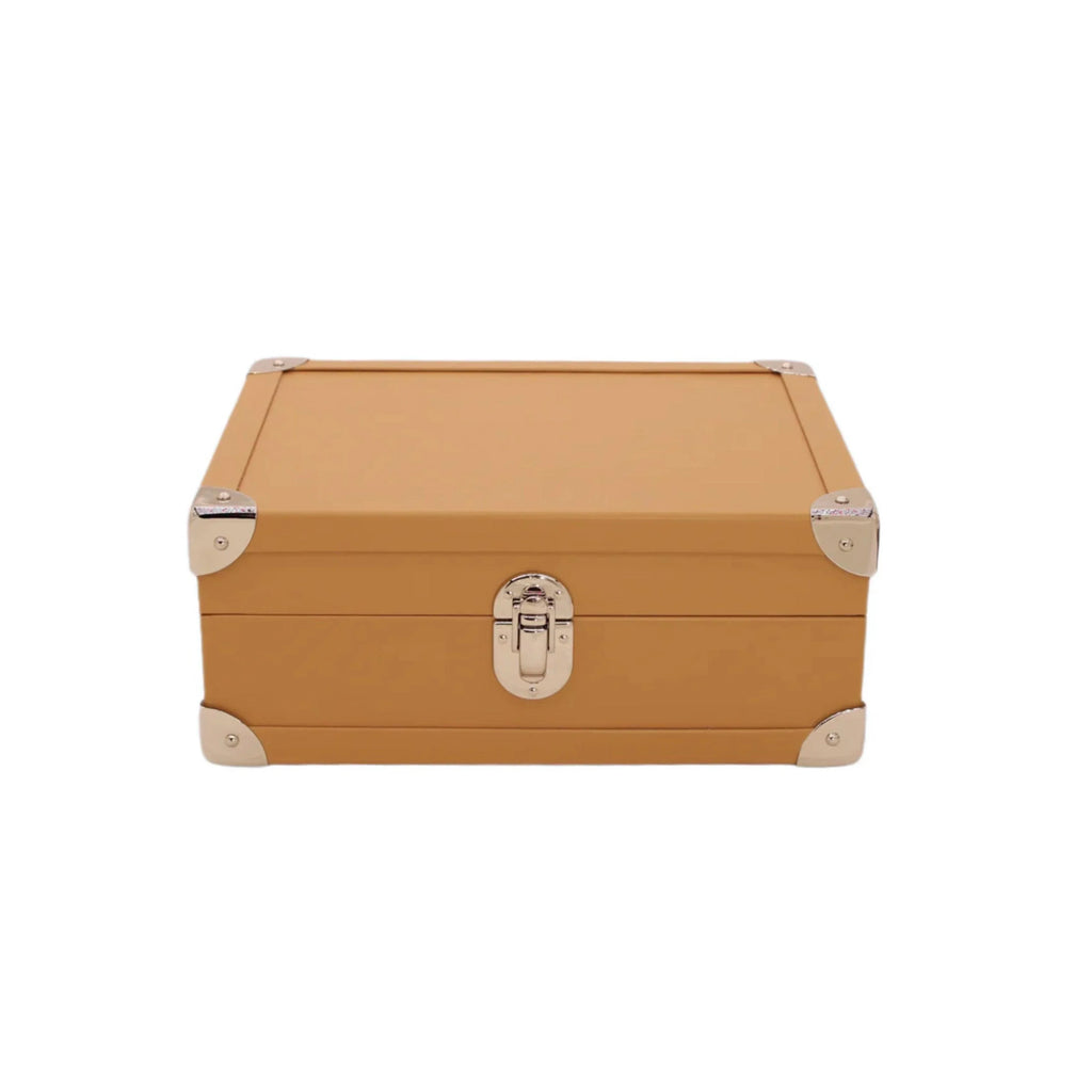 Tan leather storage box with silver metal corners and latch, luxury handcrafted design