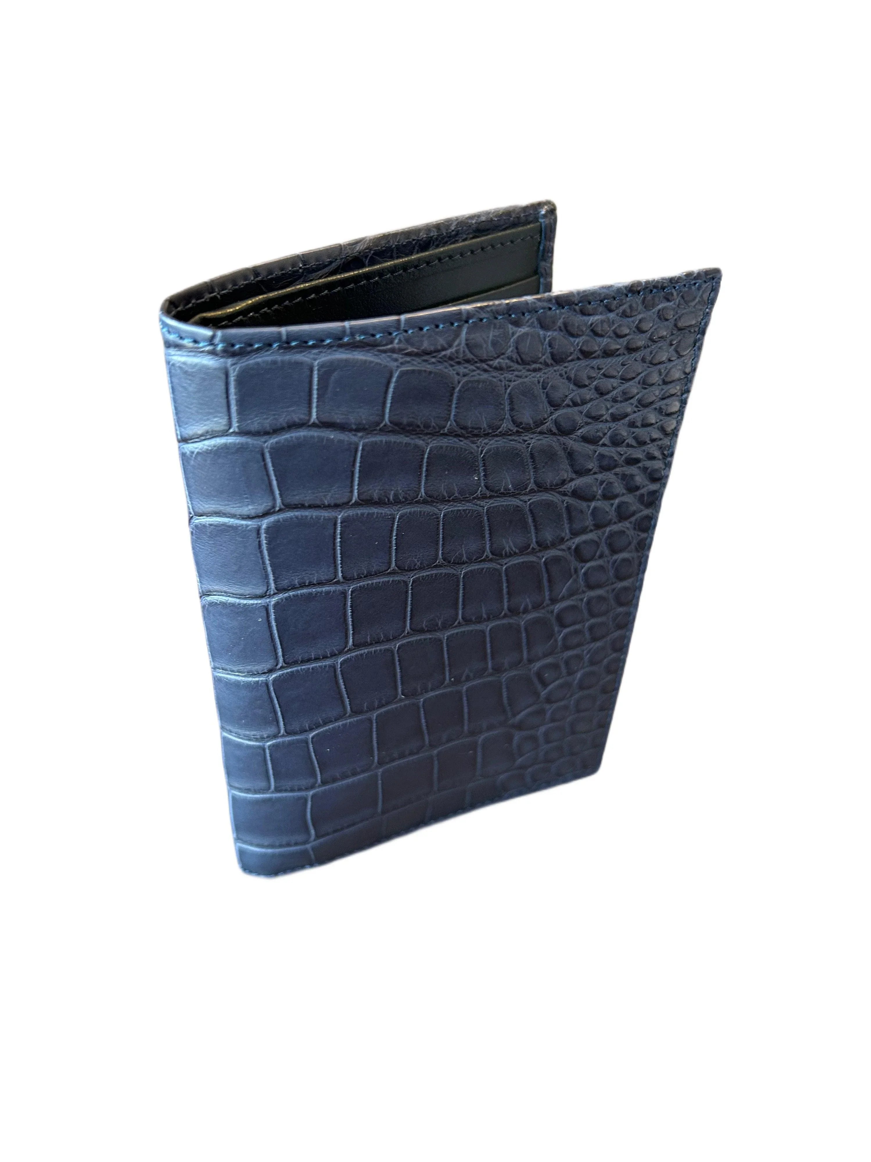 Luxury handcrafted navy blue crocodile embossed leather wallet on white background