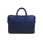 Blue leather briefcase carried by handle, front view
