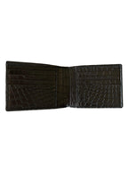 Black crocodile leather wallet close-up of exotic leather texture
