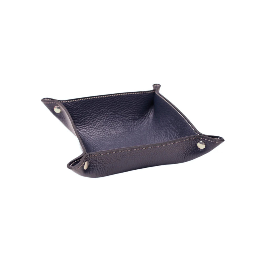 Dark brown Italian leather valet tray with silver snap buttons on white background