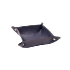 Dark blue Italian leather valet tray with silver snap buttons on white background