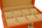 Orange leather watch box with beige velvet interior and individual compartments