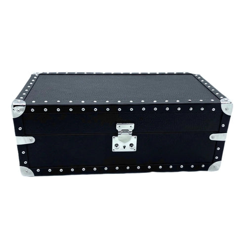 Black leather trunk with silver metal corners and studs, luxury handcrafted storage box