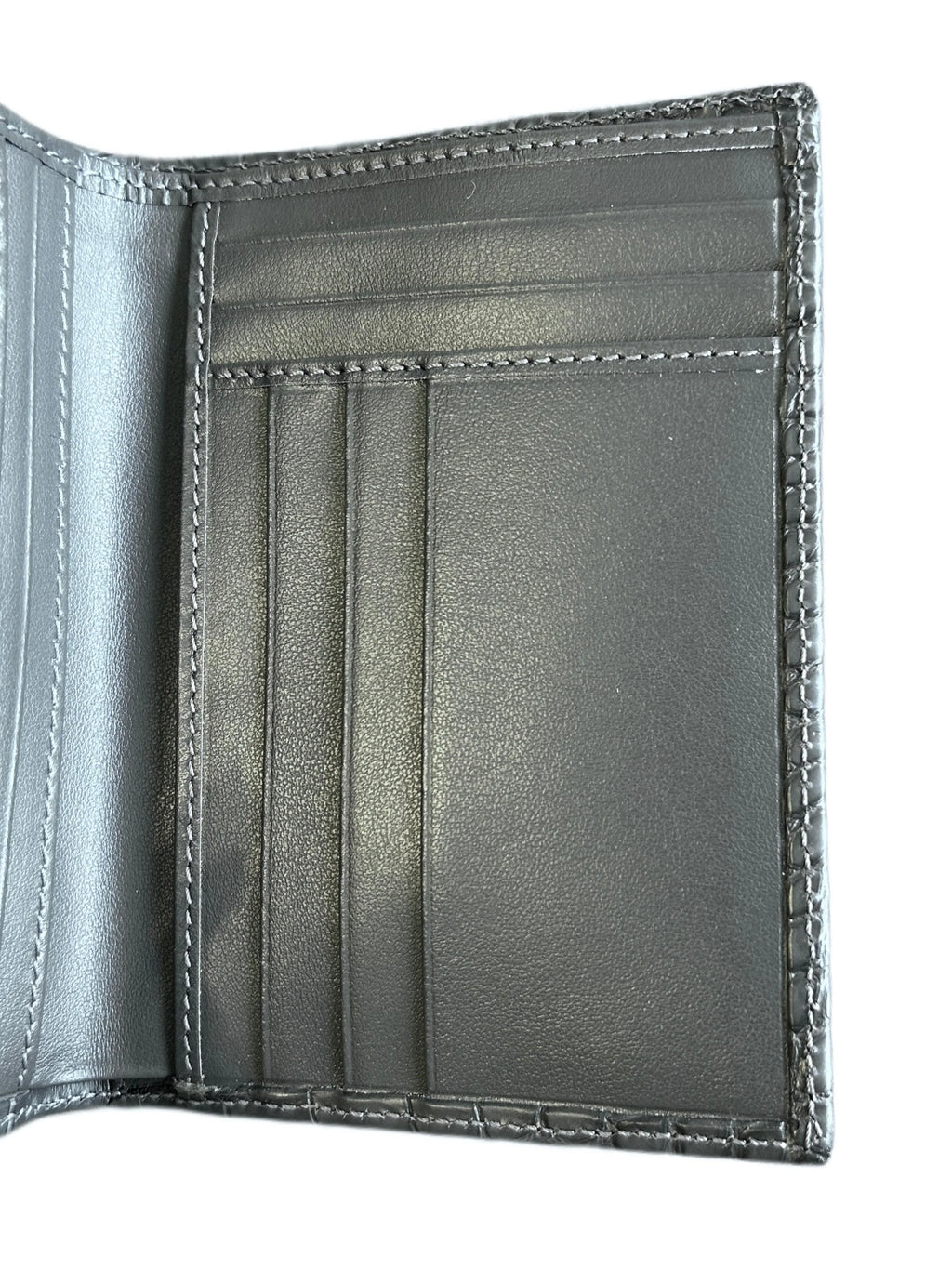 Gray handcrafted Italian leather wallet interior with multiple card slots