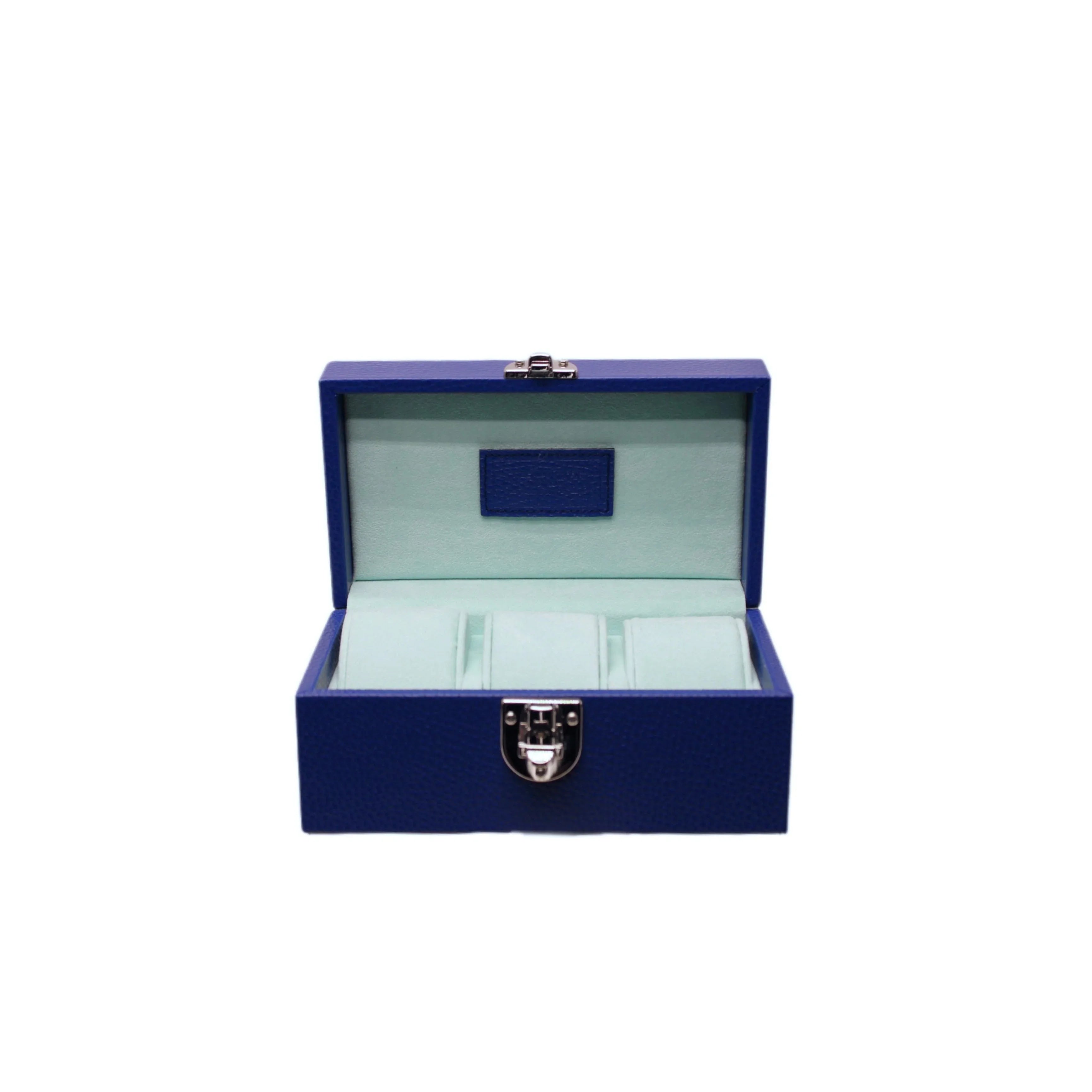 Open blue leather jewelry box with soft light interior and silver clasp
