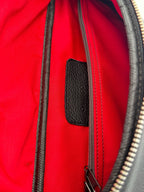 Leather belt bag styled on model, waist view
