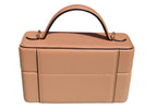 Nude Mirror Handbag carried by hand, front view