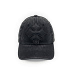 Front view of a black washed cotton six-panel baseball cap with a tonal black calf leather logo patch