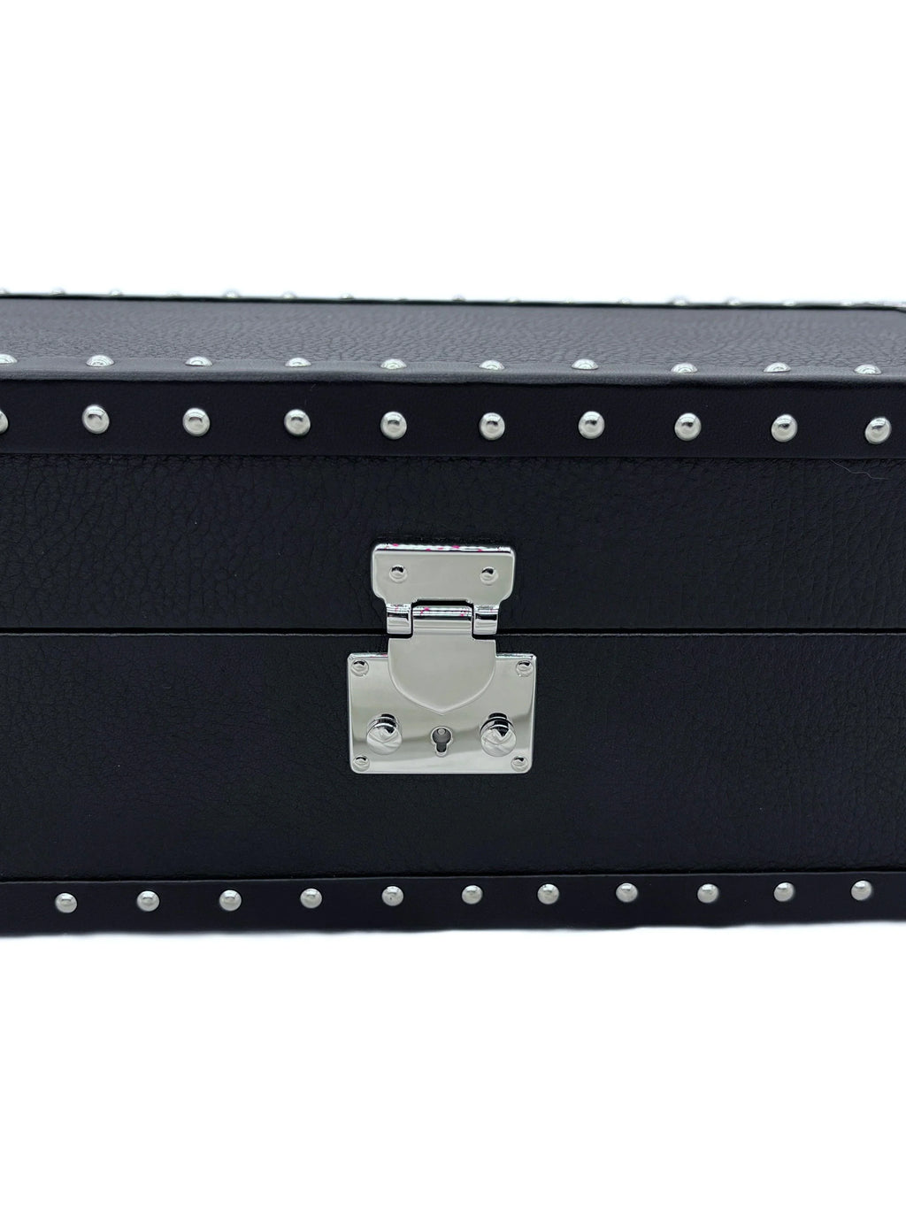 Black leather box with silver metal studs and latch, luxury handcrafted design