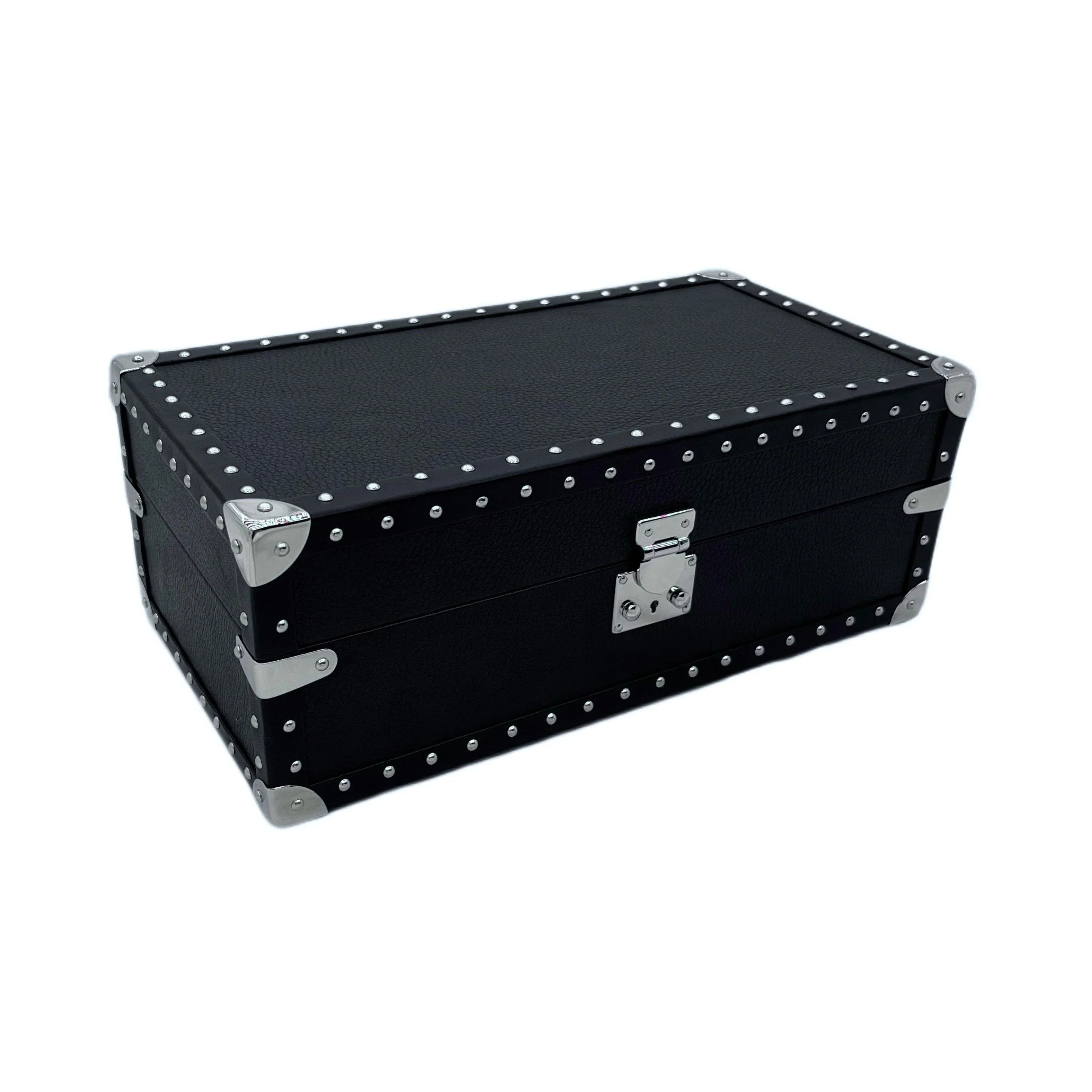 Luxury black leather trunk with metal rivets and silver hardware on white background