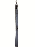 Weekend Bag in grey leather, worn with adjustable shoulder strap