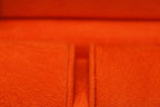 3-Place Watchbox in dark green leather, close-up of brass clasp