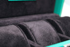 3-Place Watchbox in green leather, close-up of brass clasp