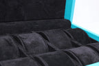 8-Place Watchbox in turquoise and black leather, open showing interior