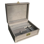 Open jewelry box with compartments on a white background