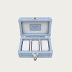 Open sky blue Italian leather watch box showing Alcantara-lined interior with 3 watch cushions