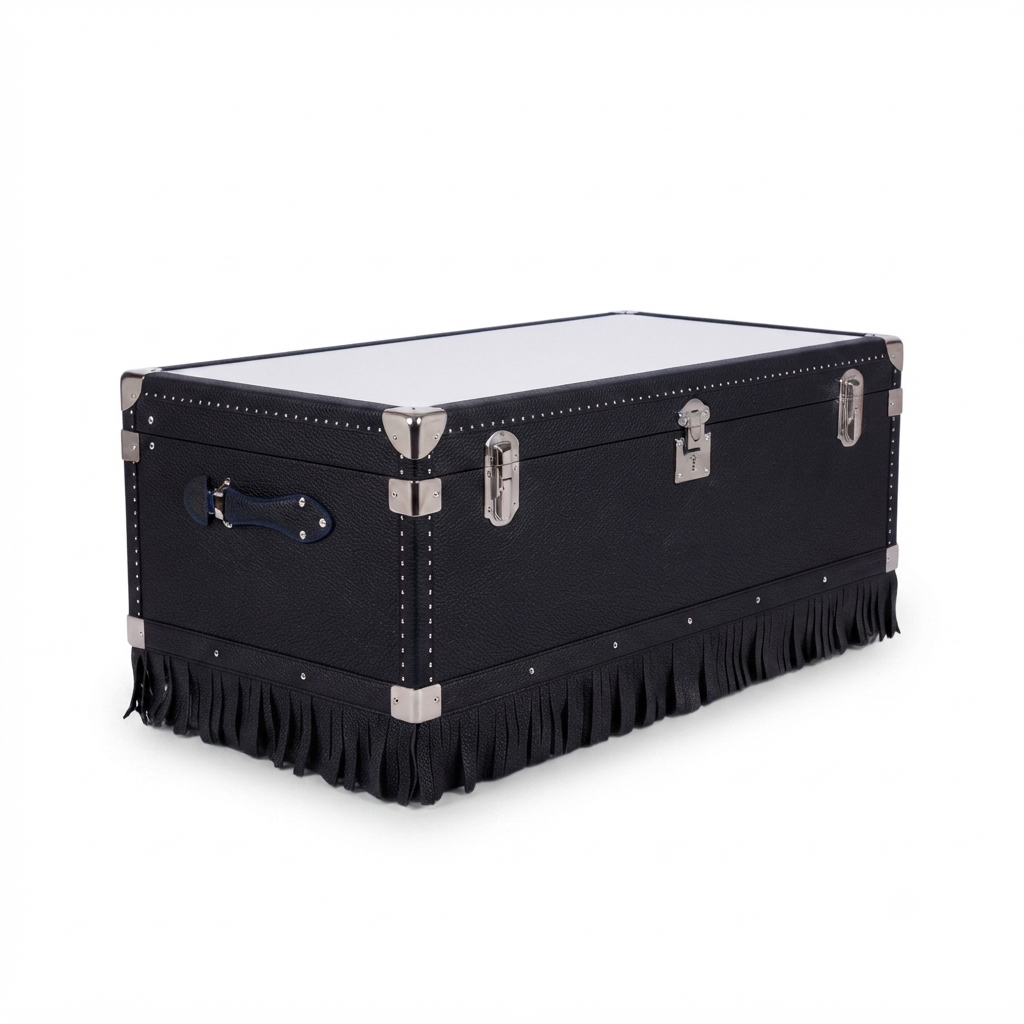 Table Trunk in black leather, close-up showing craftsmanship and hardware