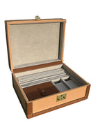 Wooden jewelry box with interior compartments on a white background