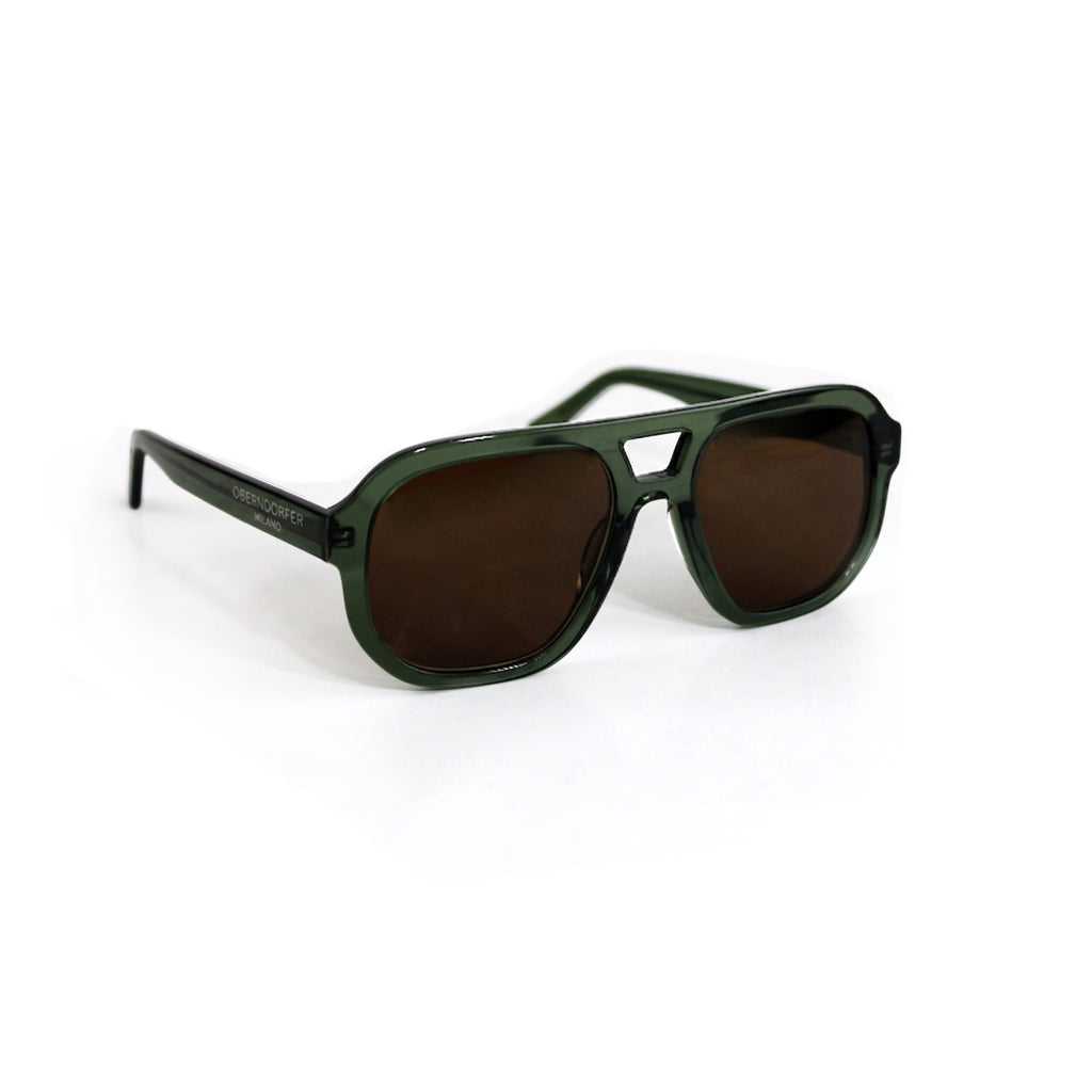 handmade transparent forest green acetate aviator sunglasses with German Zeiss brown lenses made in Italy.