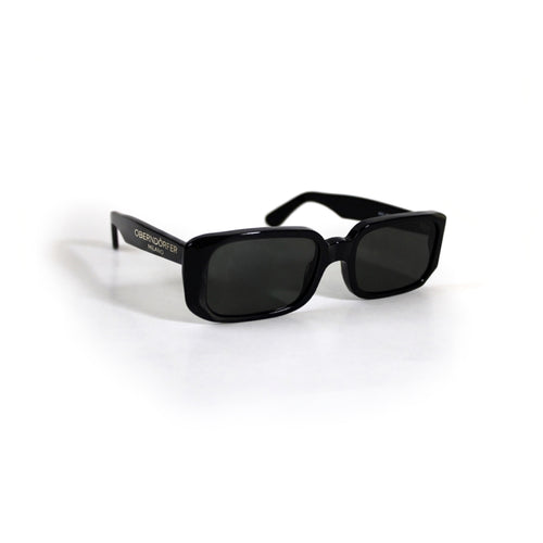 Oberndorfer Milano handmade black acetate rectangle sunglasses with solid dark German Zeiss lenses.