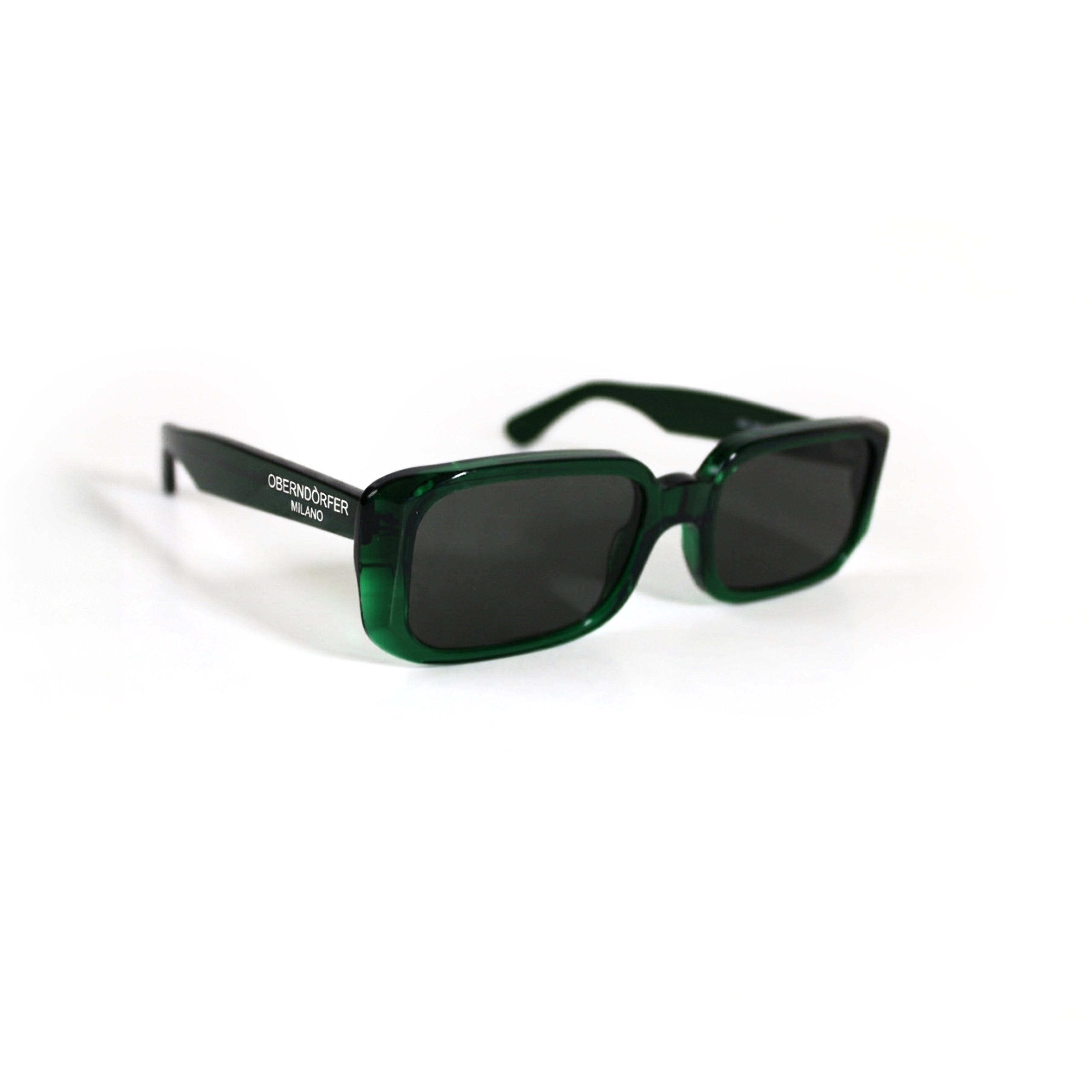 Oberndorfer Milano handmade transparent green acetate rectangle sunglasses with solid dark German Zeiss lenses.