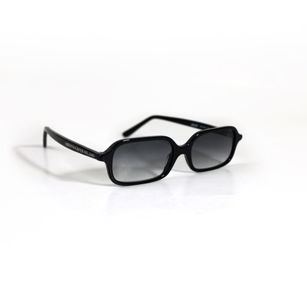 Oberndorfer Milano handmade slim black acetate rectangle sunglasses with grey gradient German Zeiss lenses.