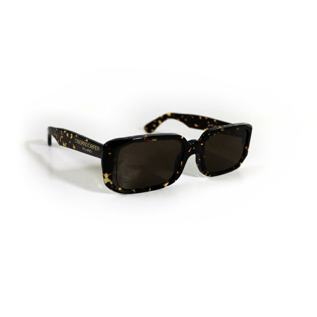 Oberndorfer Milano handmade tortoise acetate rectangle sunglasses with solid dark German Zeiss lenses.