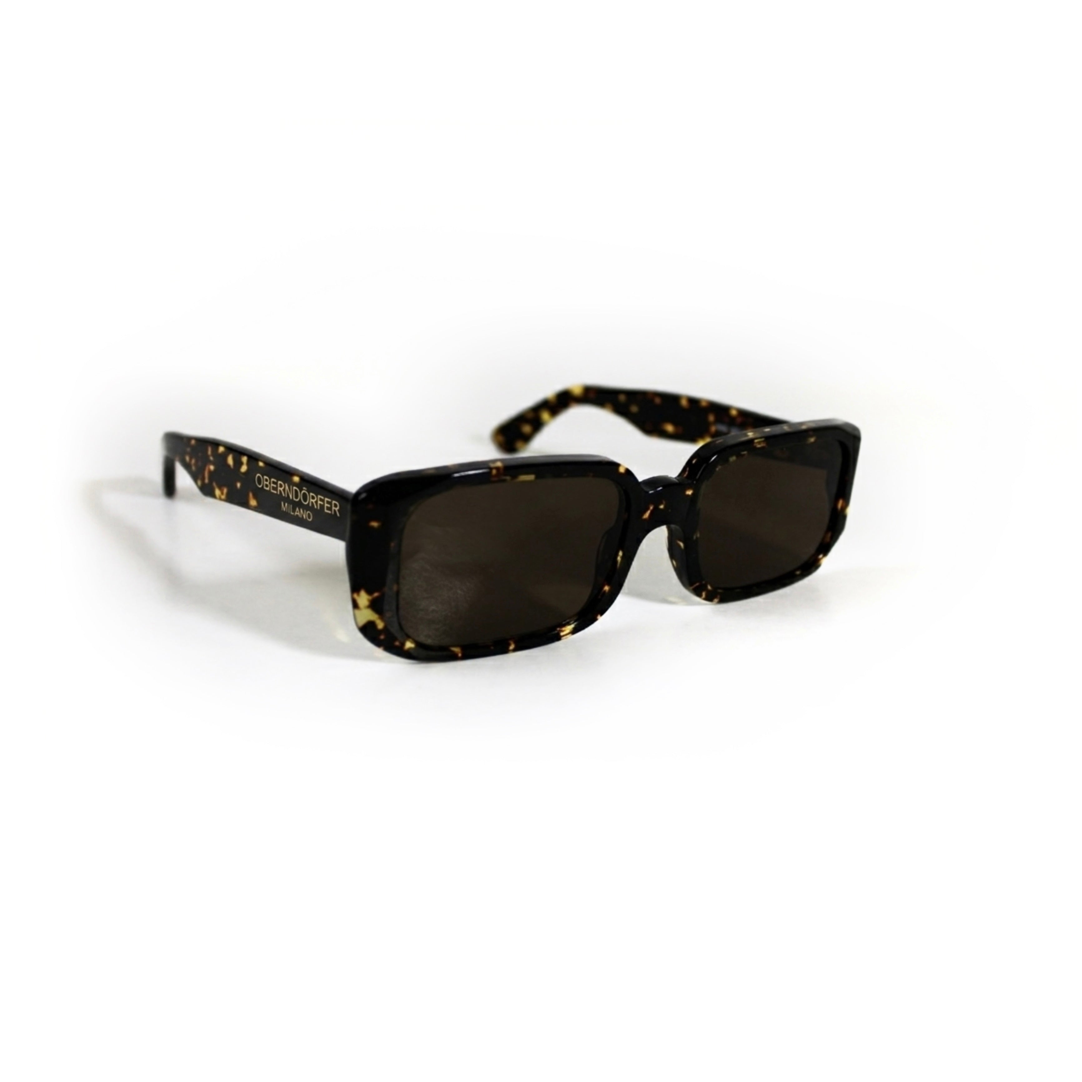 Oberndorfer Milano handmade tortoise acetate rectangle sunglasses with solid dark German Zeiss lenses.