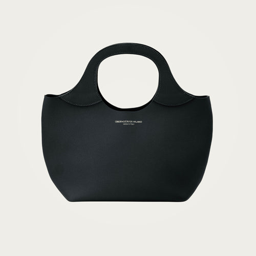 Bag Model 017 in black Togo leather on an ivory studio ground