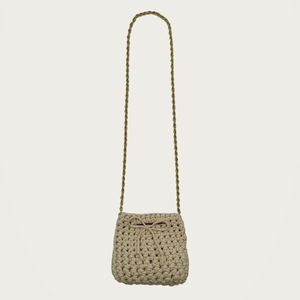 Mini Crochet Handbag - Beige on an ivory studio ground