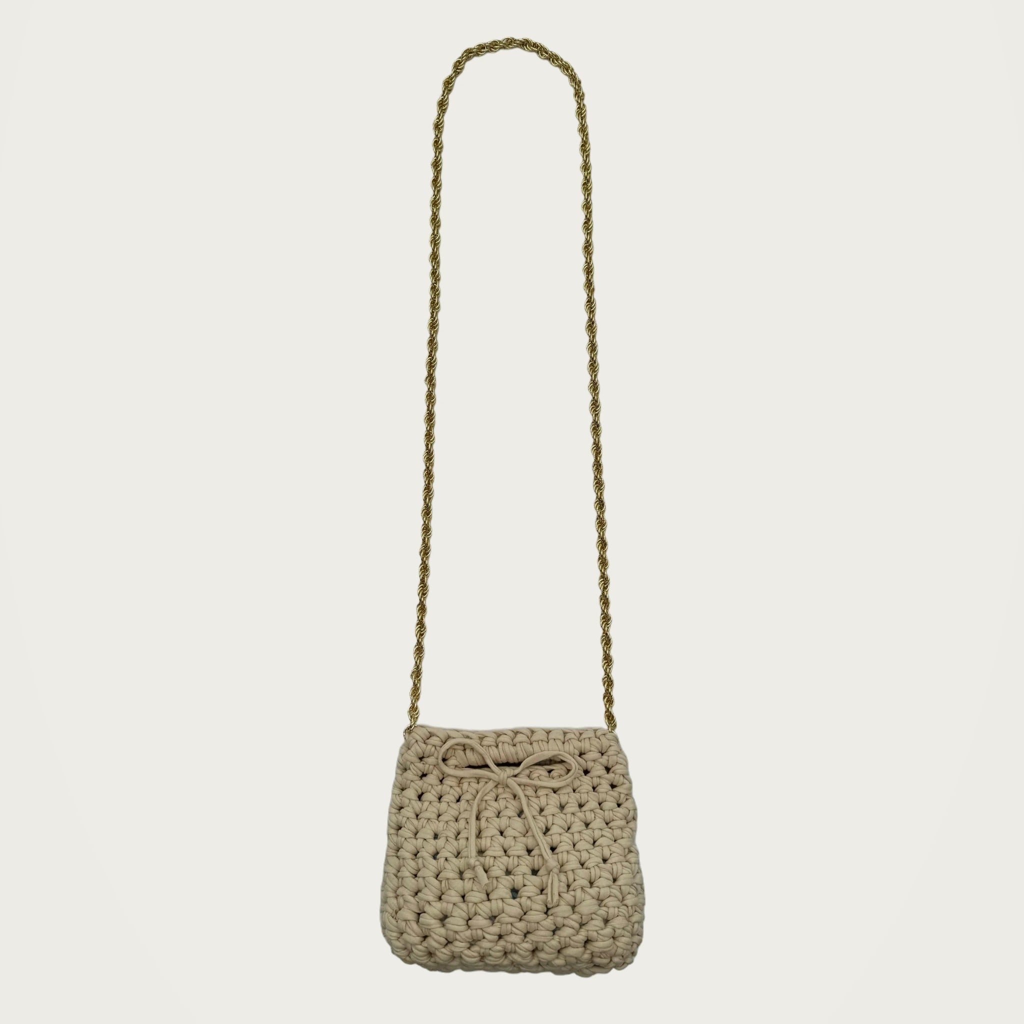 Mini Crochet Handbag - Beige on an ivory studio ground