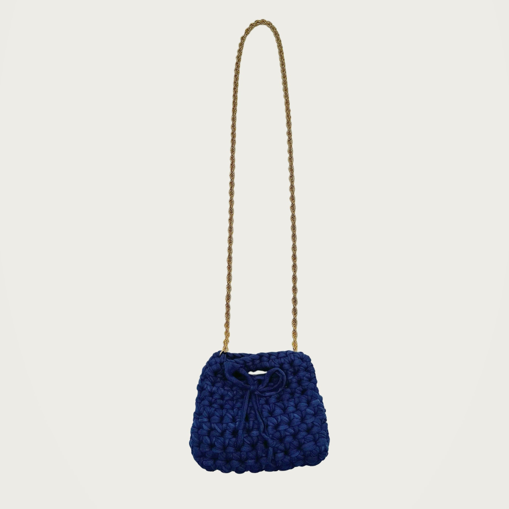 Mini Crochet Handbag - Blue on an ivory studio ground