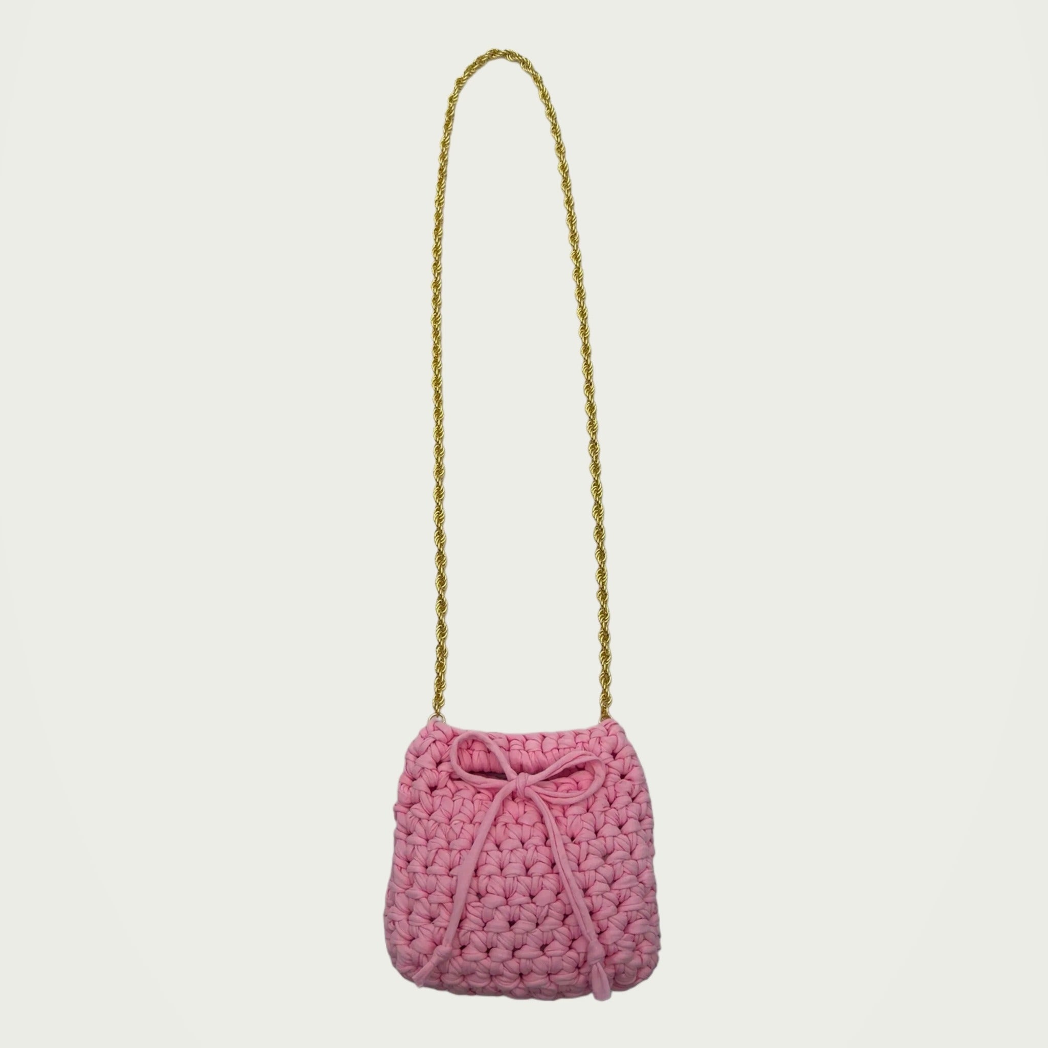 Mini Crochet Handbag - Pink on an ivory studio ground